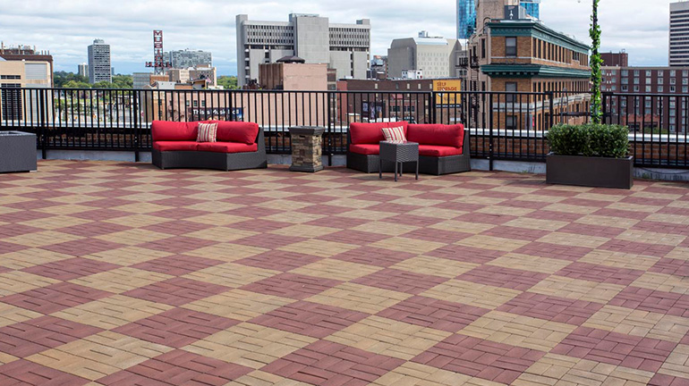 A rooftop deck using Aspire Pavers by Brava (formerly known as AZEK Pavers)
