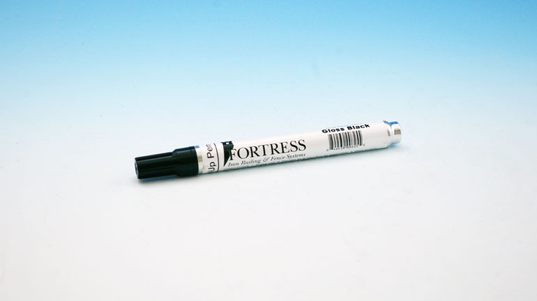 Fortress touch-up paint pen on a blue and white background.