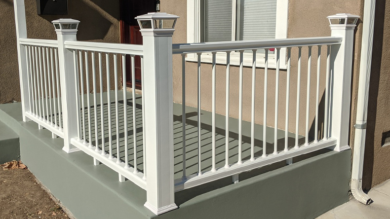 A scratched white deck railing returned to its former glory using Touch-Up Paint