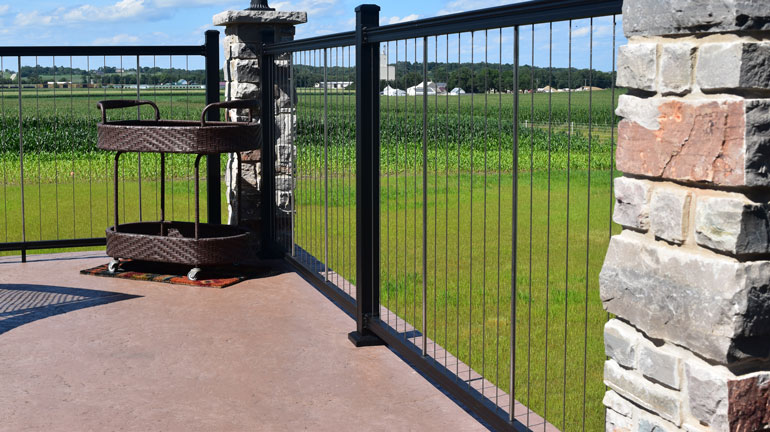 Low-maintenance vertical cable railing offers the benefits of a stylish cable railing system