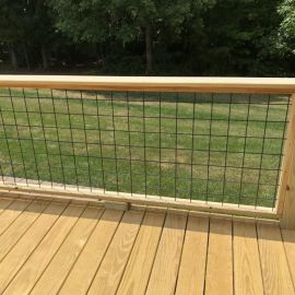 Wild Hog Railing delivers hog wire fence panels in a rich textured black finish perfect for nearly any deck style.