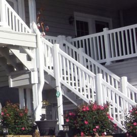 The Manchester Vinyl Stair Rail by Durables, shown in White