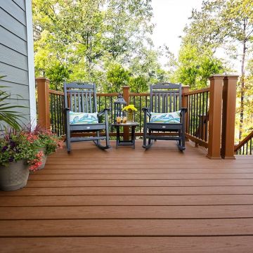 Get the rich look and texture of wood with Trex Select Composite Deck Boards, shown in Saddle color.
