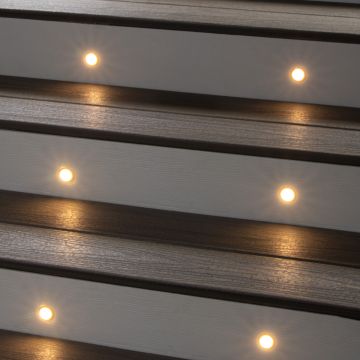 Flush LED Riser Light with Trim Ring by LMT Mercer-Black-Installed and Illuminated