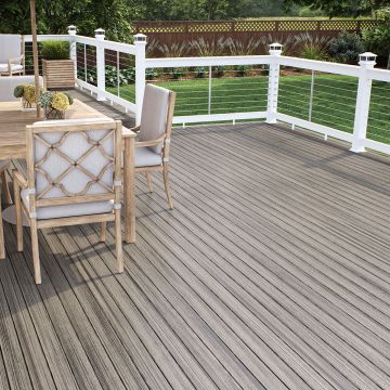 Open up a comfortable gathering space with Deckorators Vista Deck Boards, shown in Driftwood.