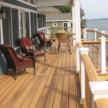 Keep the sun shining year-round with stain and fade-resistant Barrette Decking Siesta Deck Boards, shown in Golden Teak.