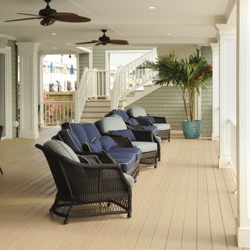 The light, airy Brownstone finish of TimberTech Advanced PVC Harvest decking