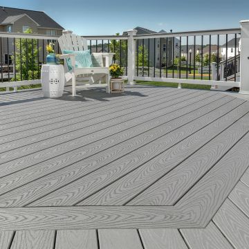 The simple elegance of Trex Select in Pebble Grey is a perfect canvas for unique deck board patterns.