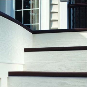 Woodgrain White Riser Boards by Trex create a perfect and crisp design for your deck's stairs.