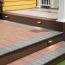 The distinctive bullnose of Aspire Border Pavers on stairs, shown in the Waterwheel color