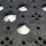 A detailed view of the bottom of the Dimpled Grid for Aspire Pavers
