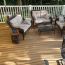 Help your white deck railing pop with the neutral look of Barrette MVP decking shown in Golden Teak.