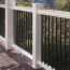 Black metal balusters in white composite railing: it's a classic look that never goes out of style