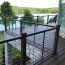 Sturdy posts keep guests safe while the AFCO Pro Cable Railing system opens up your view