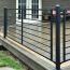 The sweeping, horizontal style of the Fortress FE26 Axis deck railing system
