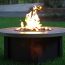 The included 75,000-BTU burner burns brighter and warmer than other fire tables