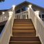 Make your deck stairway safe in the evening with the help of Solar Post Cap Lights for Trex Transcend Post Sleeves. Shown with white light function on.