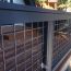 The Raw Steel Mesh of the Tahoe Woven Railing Panel from Wild Hog Products ages naturally to match your deck's rustic design.
