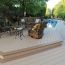 Moisture-resistant PVC is perfect for installation near lakes or pools, shown in Brownstone