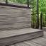 Complete your deck stairs with multi-tonal Trex Transcend Riser Boards, shown in Island Mist.