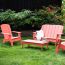 The TimberTech Adirondack Chair, shown with the rest of the TimberTech Invite Collection of outdoor furniture