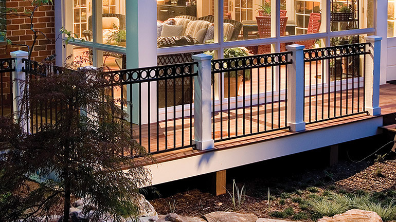 A decorative steel railing with the Fortress FE26 Accent Mid-Rail