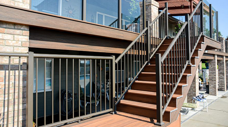 Century aluminum railing creates a smooth, rounded deck rail look