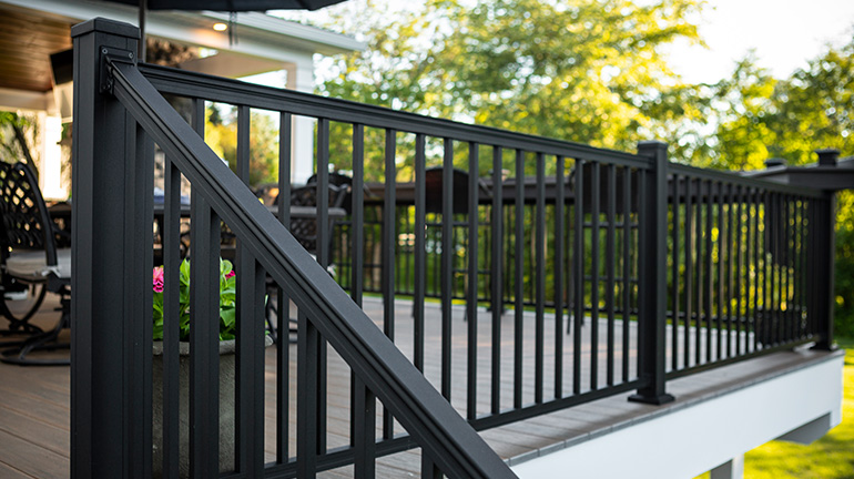 The beautifully-crafted detail of a Key-Link American Series metal deck post and deck railing
