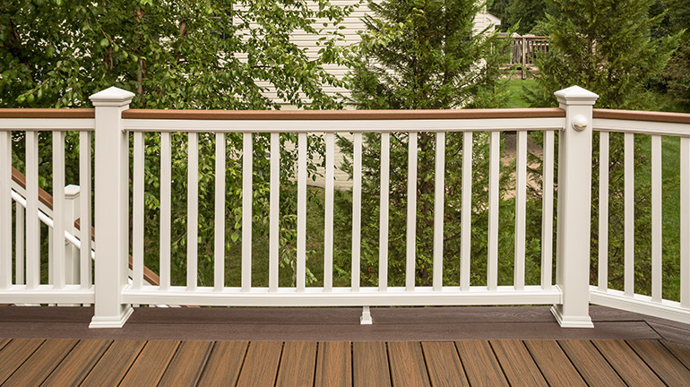A classic Trex Transcend Composite Railing with a brown and white color combination