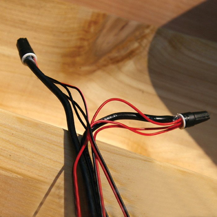 Light wire with silicone filled wire nuts and low voltage wire