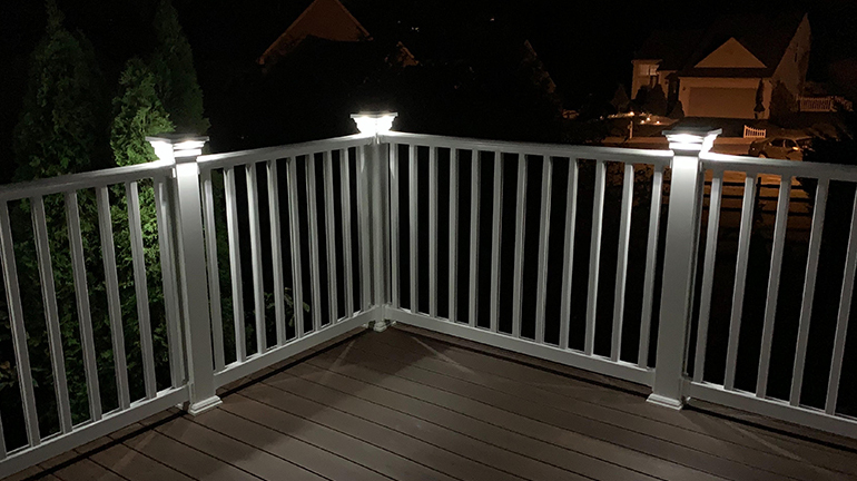 Keep your home eco-friendly with the natural-looking light of solar post cap lights illuminating your deck