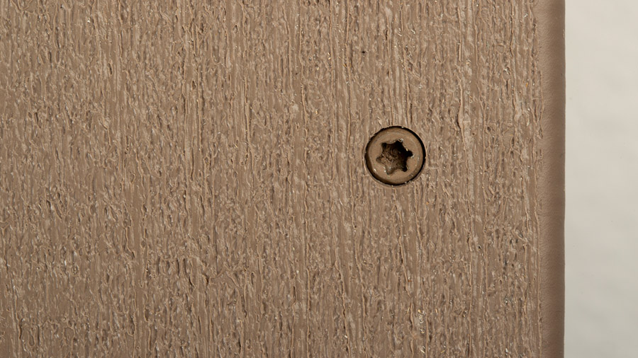 A color-matching TOPLoc screw installed into a deck board