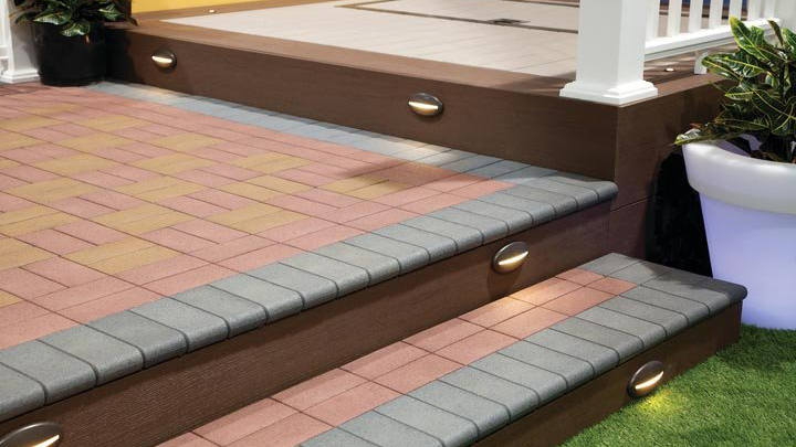 A set of stairs with bullnosed pavers on the edges