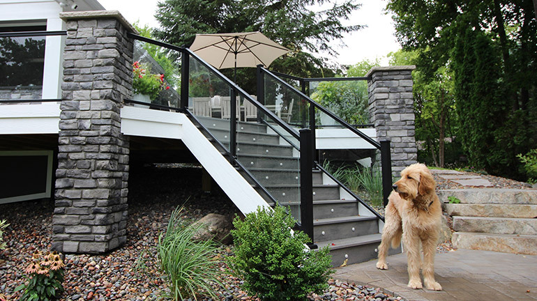 AFCO Glass Deck Railing combines the traditional and the modern in one sleek look