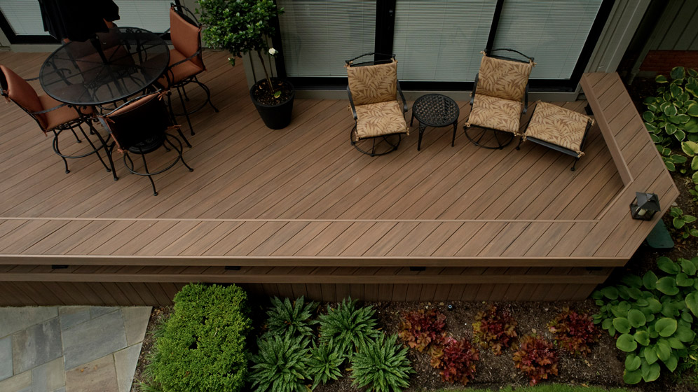 Using PVC deck boards creatively adds seating space and a gorgeous accent piece