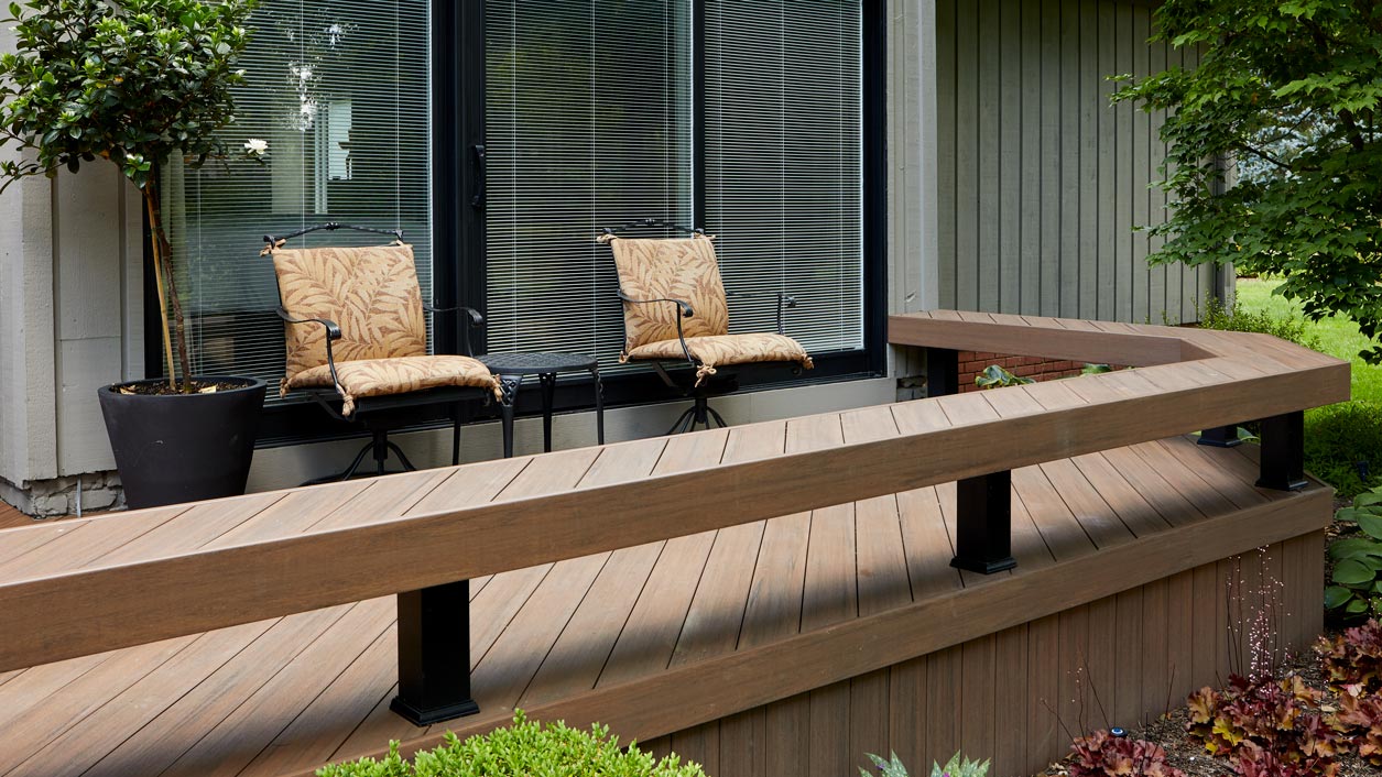 Perimeter seating made of PVC decking creates more usable space on a deck
