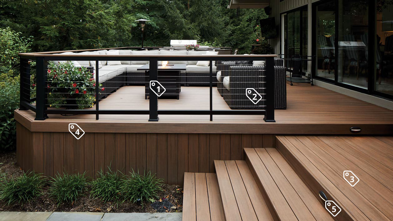 TimberTech composite deck railing brings traditional structure and size to posts and rails, while subtle cable infill adds a sleek, modern look