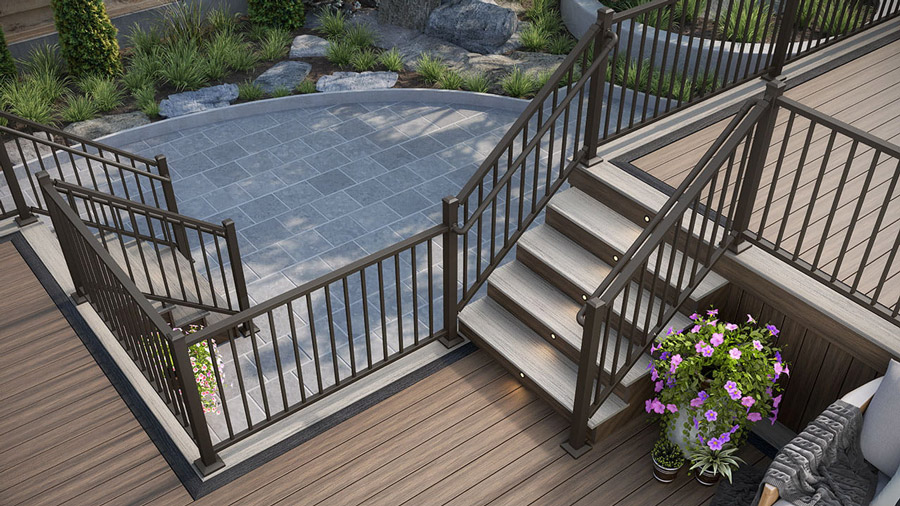 Mineral-based composite deck stairs that contrast with brown decking