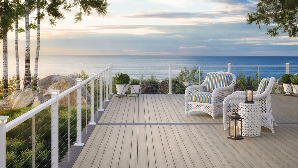 An oceanside deck with an expansive view