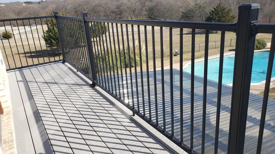 An easy-install metal Revival Railing by a pool
