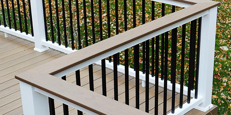 A TimberTech railing with a flat top drink rail
