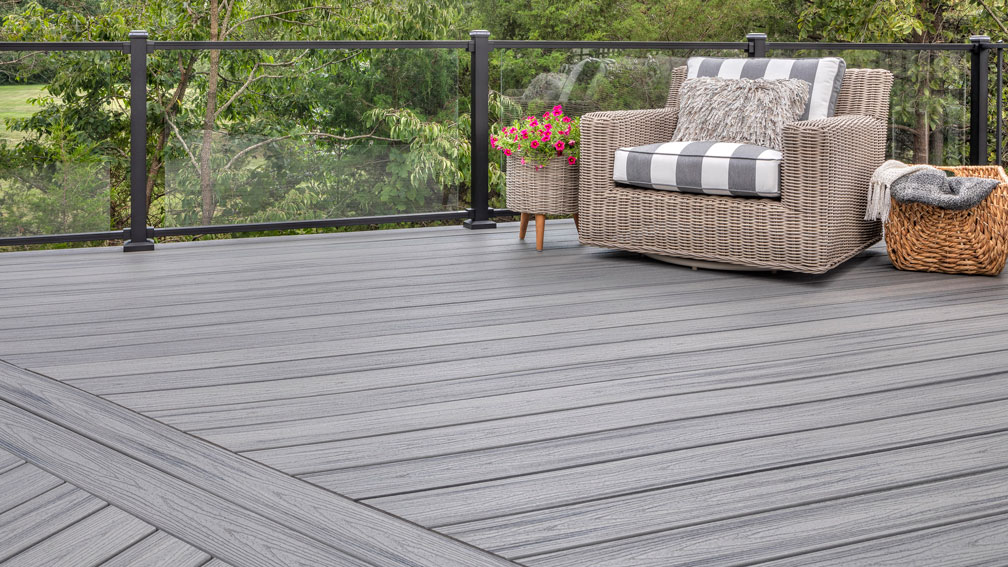Gray decking with glass railing to highlight the deck view