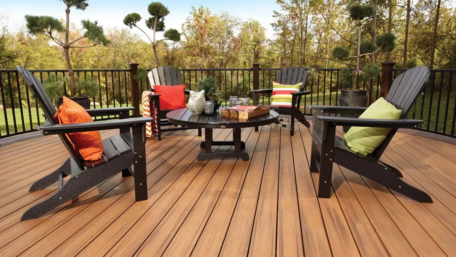 A bright, sunny composite deck made with Trex decking