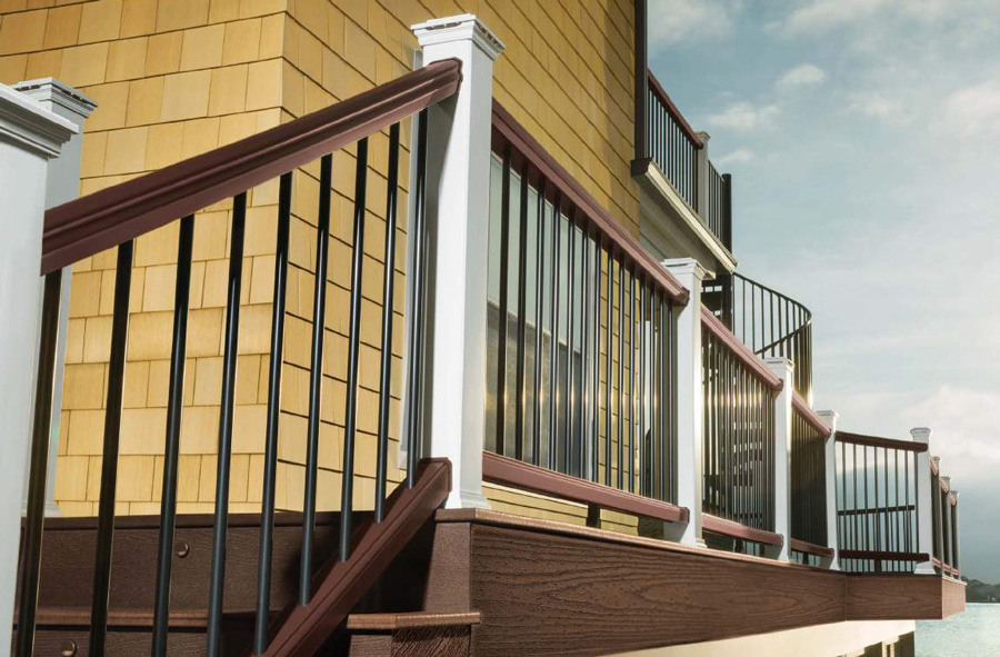 The contrast of white, brown, and black within the Trex Transcend composite deck railing system