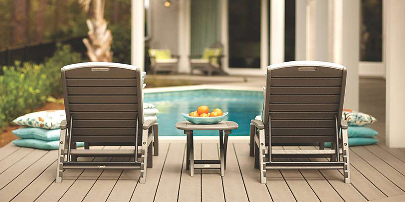 A cool brown poolside deck stays cool in the sun