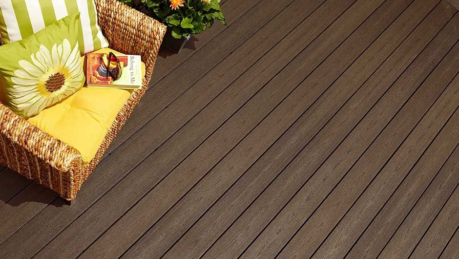 Composite decking looks like freshly-stained wood decking - but you never have to stain it