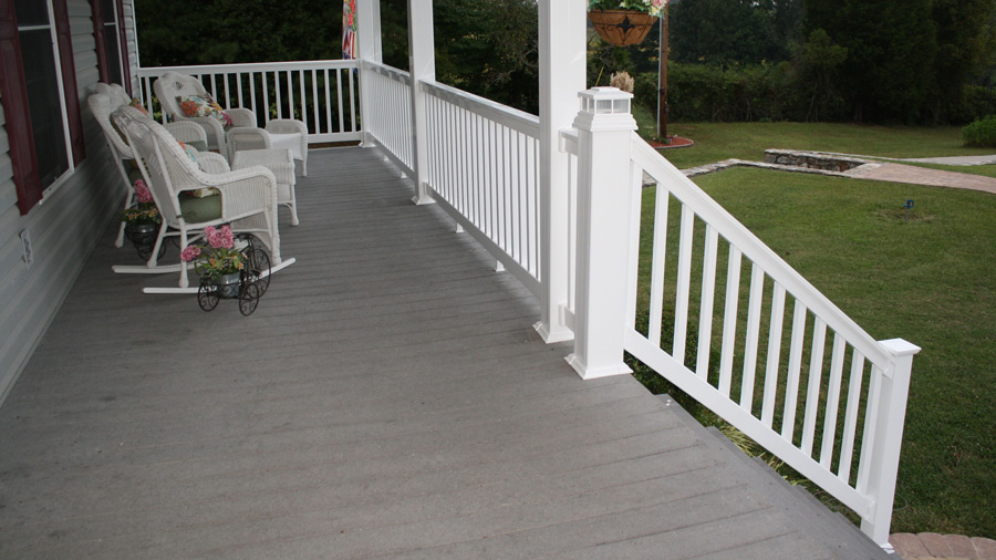 The sturdy, substantial posts, rails, and balusters of a Durables Harrington vinyl deck railing