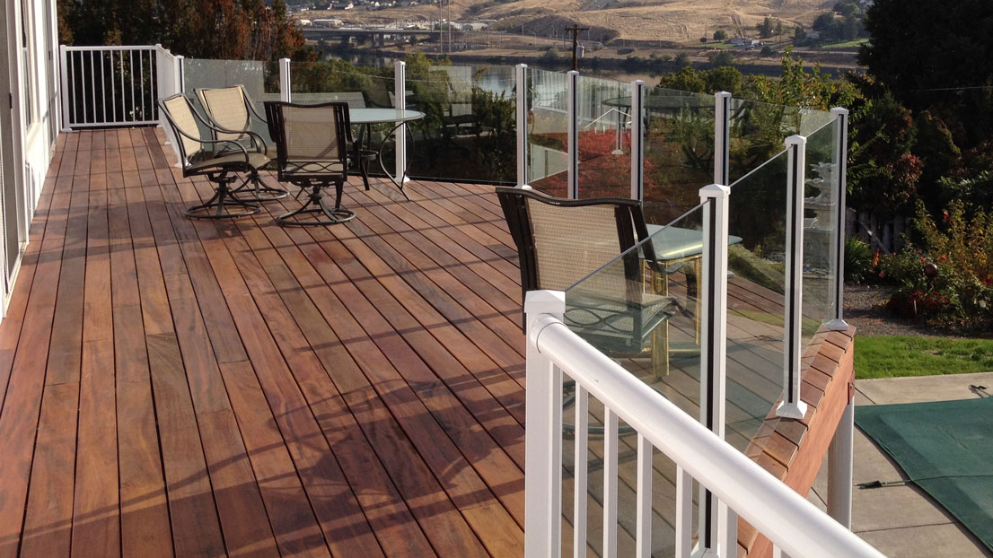 With no top or bottom rail, Century Scenic Glass Railing offers an amazing view from your deck