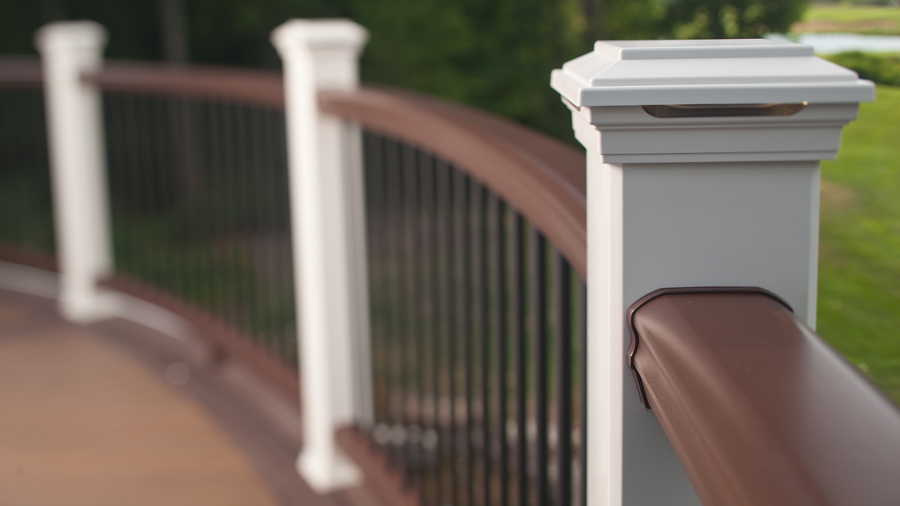 Trex Transcend deck railing with brown rails and white posts
