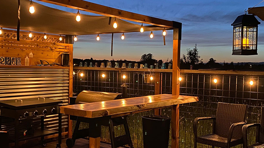 Outdoor lighting makes a pergola space feel expansive